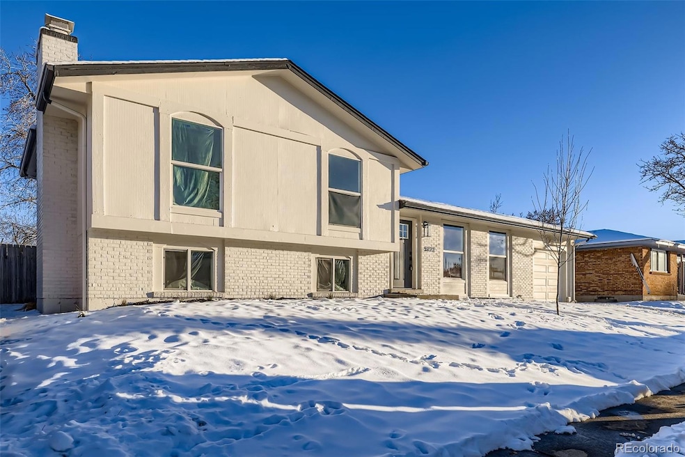 5222 Tucson Way, Denver, CO 80239 - photo 1