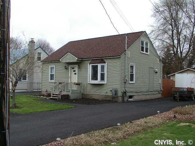Exterior Front Updated siding, windows and a brand