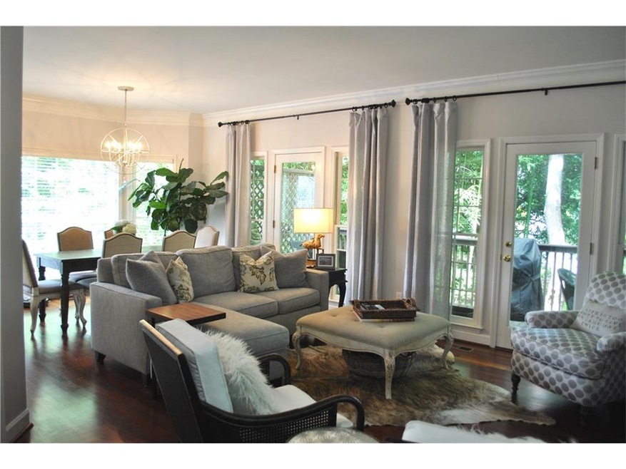 Living room/dining room combination.  Great natura
