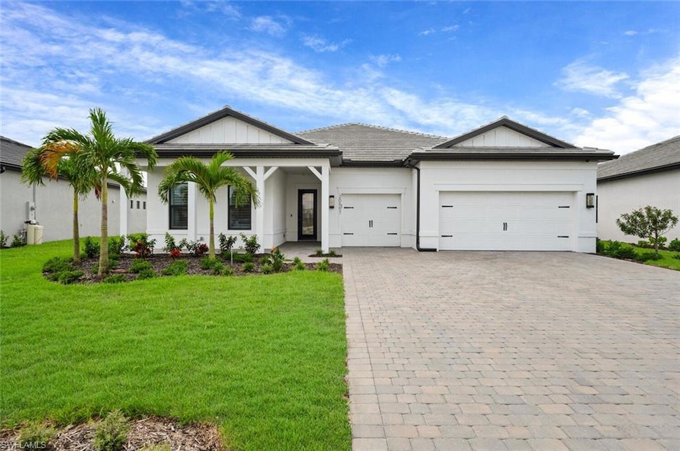 View of front of property with a front yard and a 