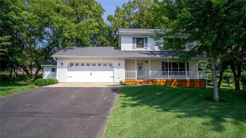 Meticulously manicured lawn and covered front porch invite you into this stunning two story home. Amazing views of the countryside. You feel like you are in the county, yet in the city limits! Home has lots of natural light. Beautifully site finished maple hardwood floors throughout the main level. All three bedrooms located on the upper level of the home.