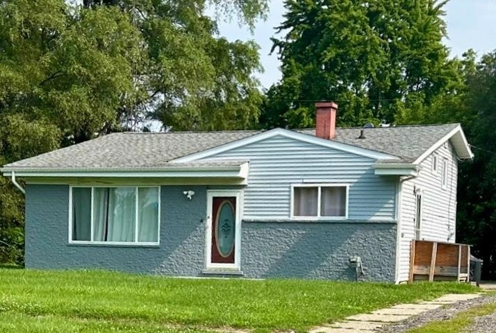 1422 W Coldwater Rd, Flint, MI 48505 - photo 1