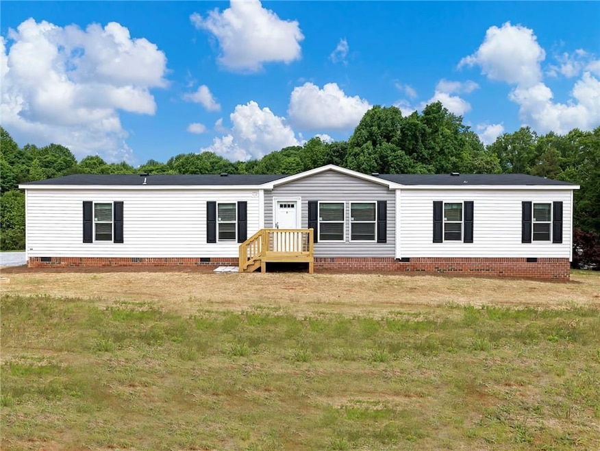 View of front of home featuring crawl space and a 