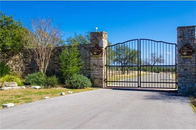 Massive metal gates are at the entrance of this fl