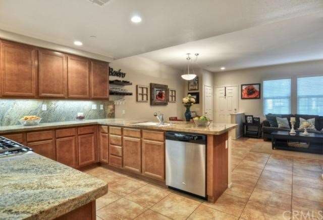 Beautiful upgraded granite with full backsplash in