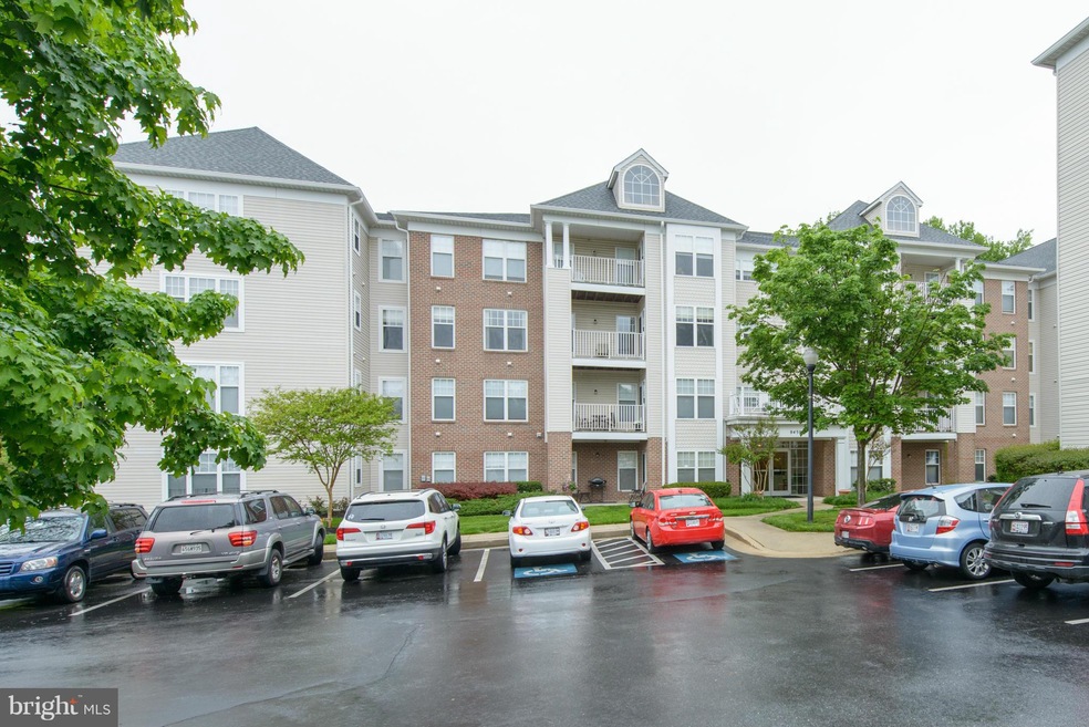 9450 Wordsworth Way unit 301, Owings Mills, MD 21117 - photo 1