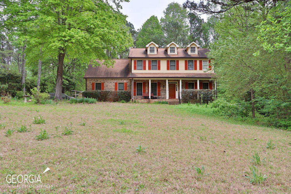 1565 Howell Highlands Dr, Stone Mountain, GA 30087 - photo 1