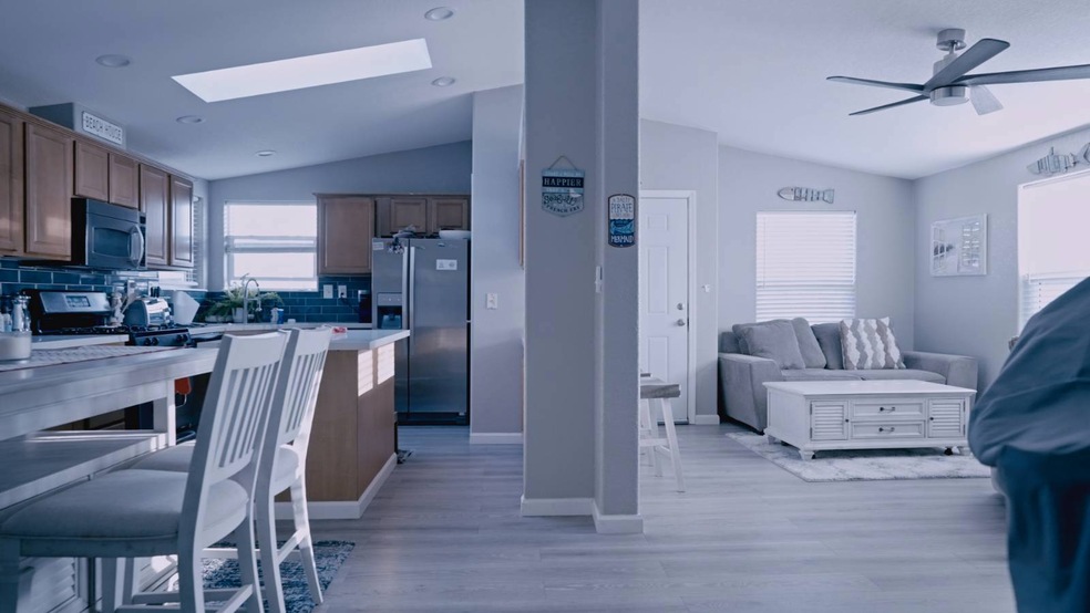 Tall ceilings with skylight and fans