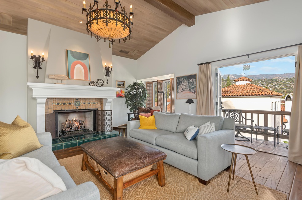Living Room with city & mountain views