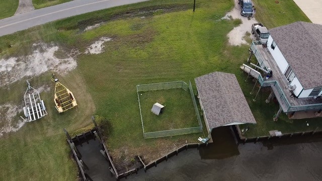 Lot 34 is the covered boat slip and gated dog run.