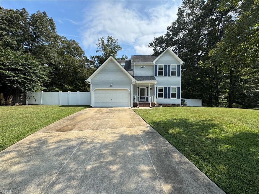 Welcome home!  Nestled on a wooded cul de sac lot.