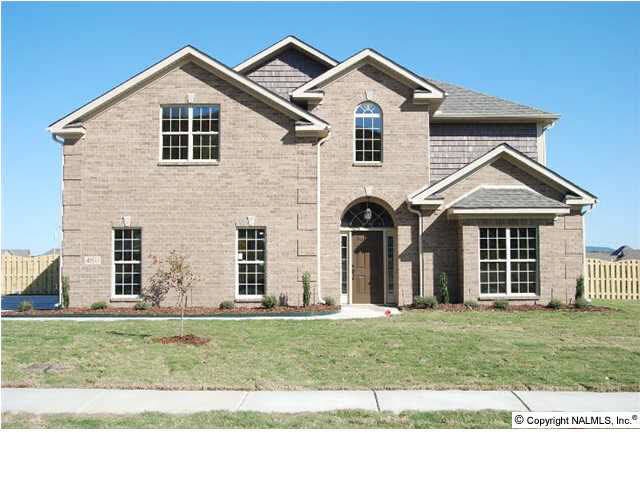 Beautiful new construction full brick home features granite countertops and tile backsplash in kitchen. Huge family room with fireplace, gas logs, hardwood floors in foyer, and great room. Tile flooring in kitchen, breakfast area and laundry room. Spaciou