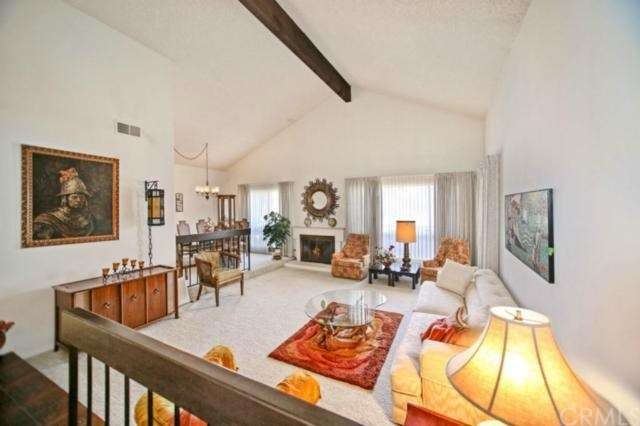 Entry into sunken living room and formal dining