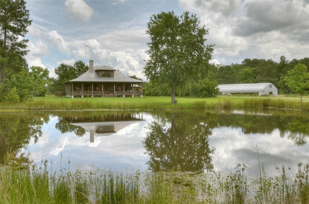 For maximum privacy home sits in middle of 44+ acr