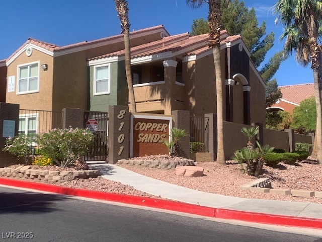 View of front of property featuring stucco siding,