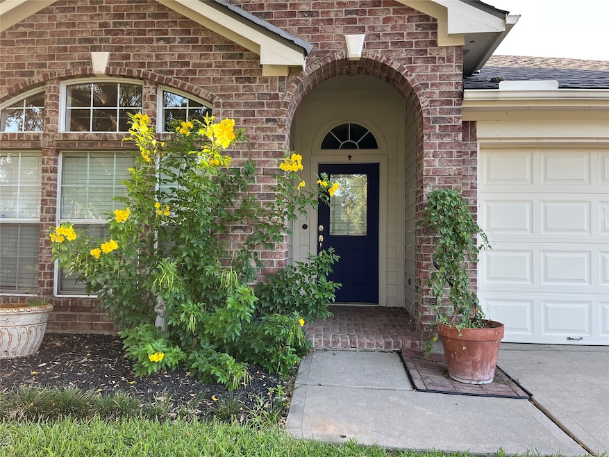 Charming entrance with elegant brickwork and vibra