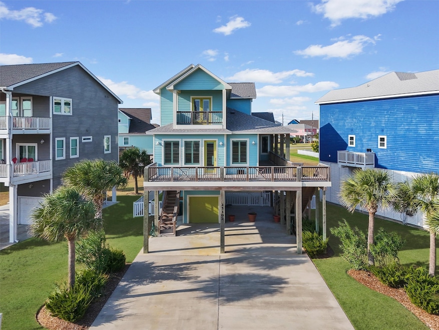 Experience coastal luxury from the moment you arrive at this stunning custom-built home, featuring elegant coastal architecture, a spacious driveway, and upper and lower balconies designed to maximize Gulf views.