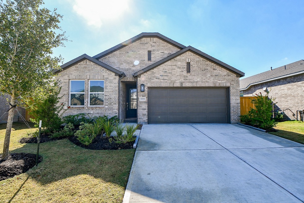 1134 Sugar Dr, Tomball, TX 77375 - photo 1