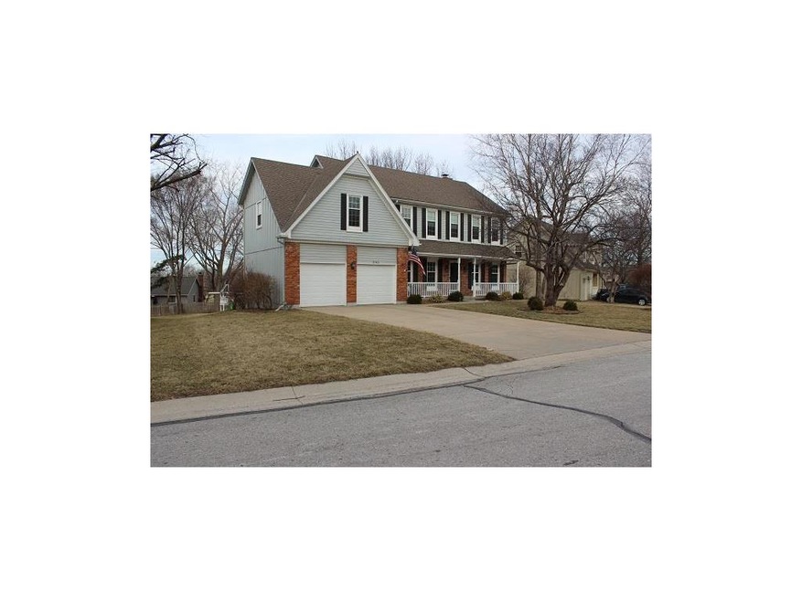 Front of the home with level driveway.