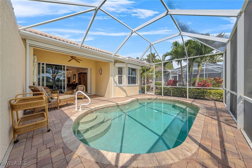 Outdoor pool featuring a patio area, a ceiling fan