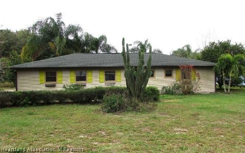 104 Lake Huntley Dr, Lake Placid, FL 33852 - photo 1