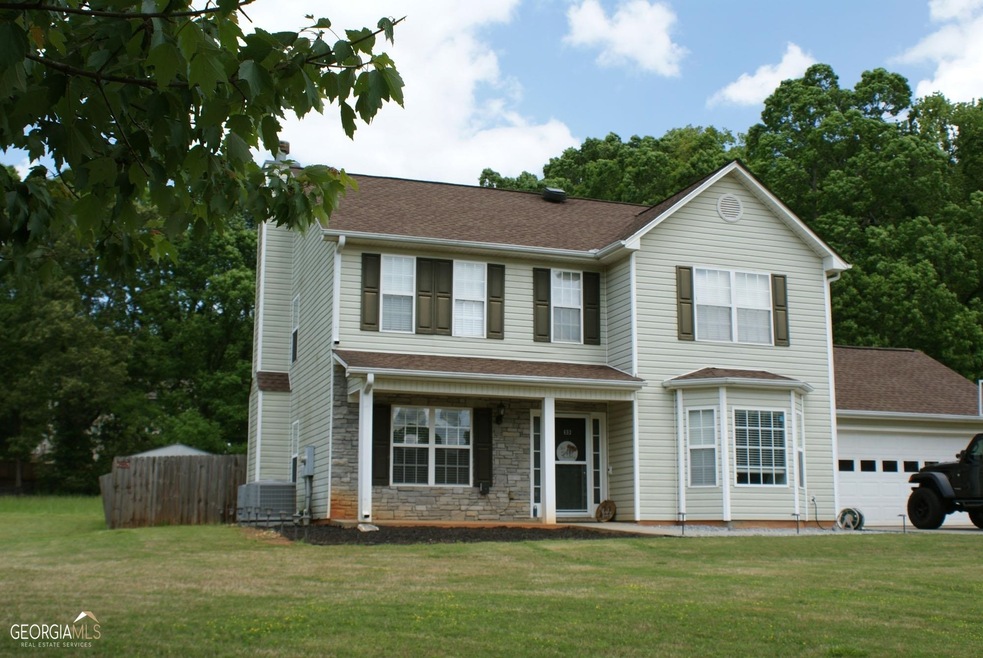 Low maintenance vinyl siding and stepless entry!