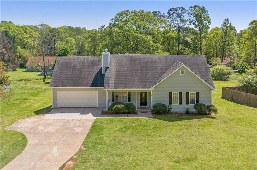View of front of house featuring covered porch, a 