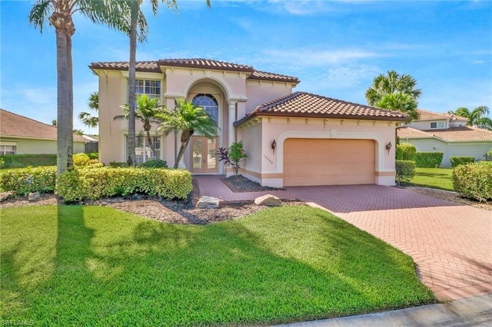 Two-Story House with a front lawn and a 2-car gara