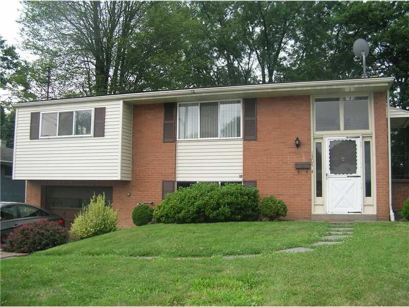 Exterior Front. Mostly brick exterior.