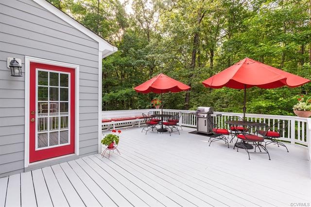 More of a deck person? This is a large deck as you can tell with two tables each set for 4 in this photo, plus there is built-in seating too! This will be the most popular BBQ spot!