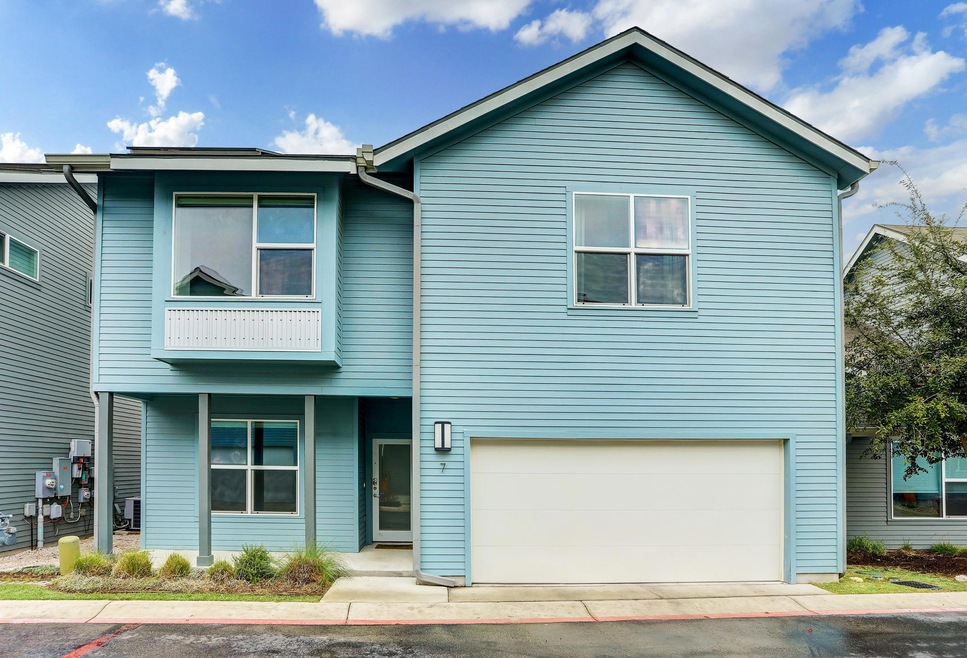 Multi unit property featuring a garage