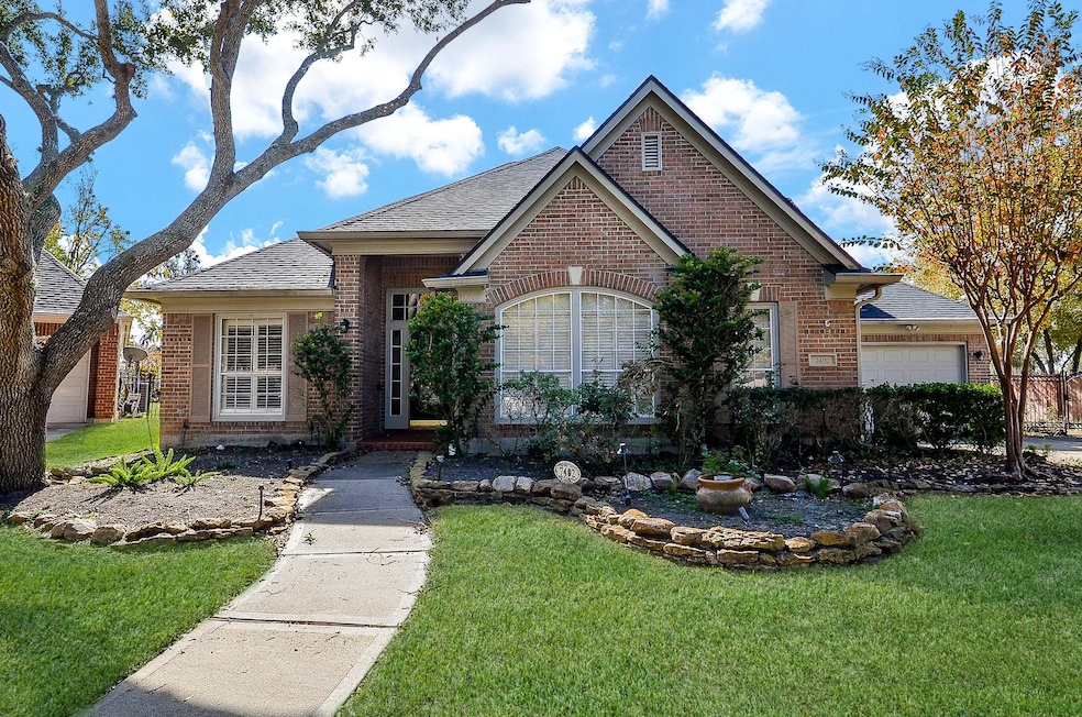 This exquisite home has large windows on the front