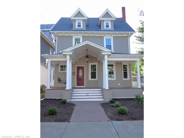 Exterior Front. Oversized front porch adds extra o
