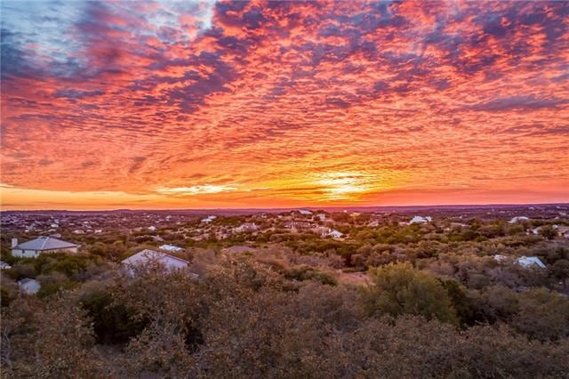 Miles of spectacular views. This private residence is one of the two highest peaks located in West Cave Estates.