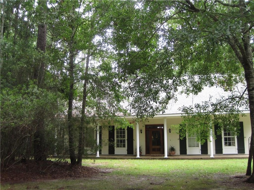 Spacious quality home with large front porch on 1.