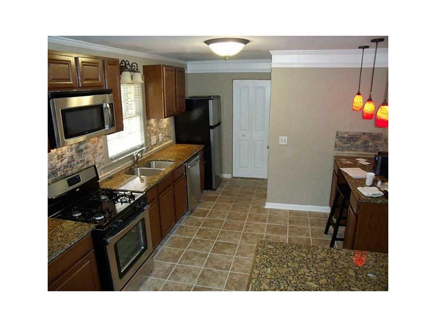 Kitchen. All-new kitchen has granite, cherry cabin
