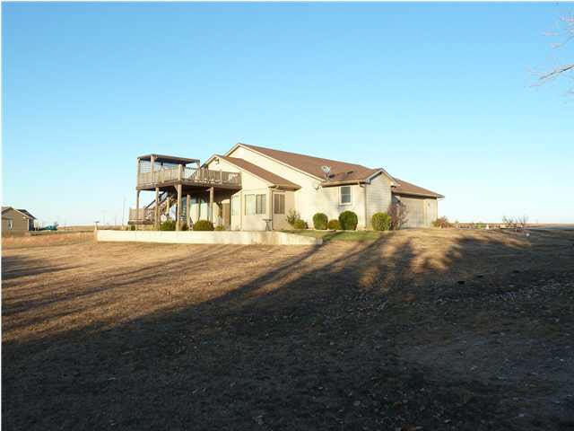 Beautiful Custom Built home on almost an Acre Lot.