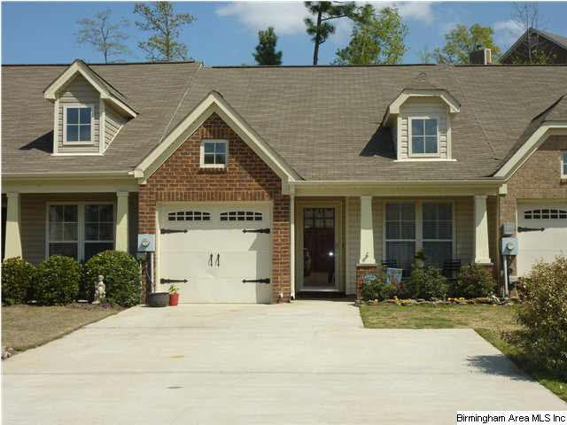 Low maintenance brick and vinyl exterior.