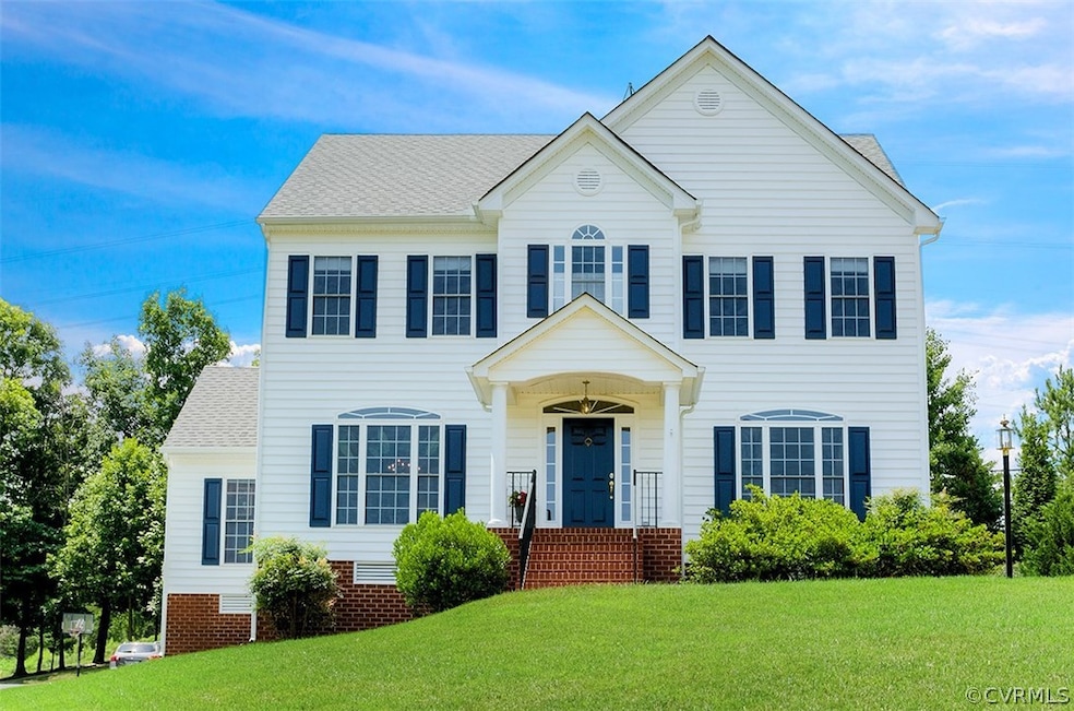 This is a beautiful 4 bedroom 2 and a half bath vinyl sided transitional located in the sought after neighborhood of The Grove.