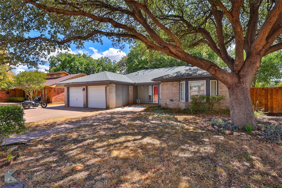Single story home with a garage