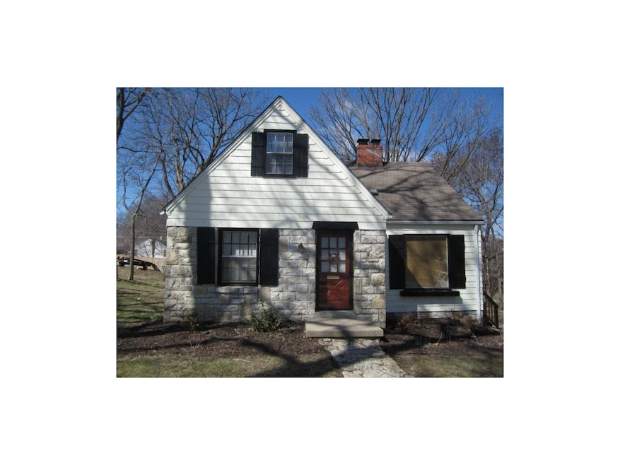 Charming Cottage with Stone Trim