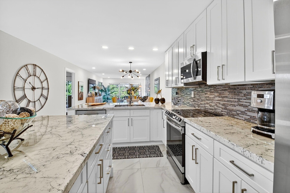 13213 Lucinda Palm Ct unit D, Delray Beach, FL 33484 - photo 1