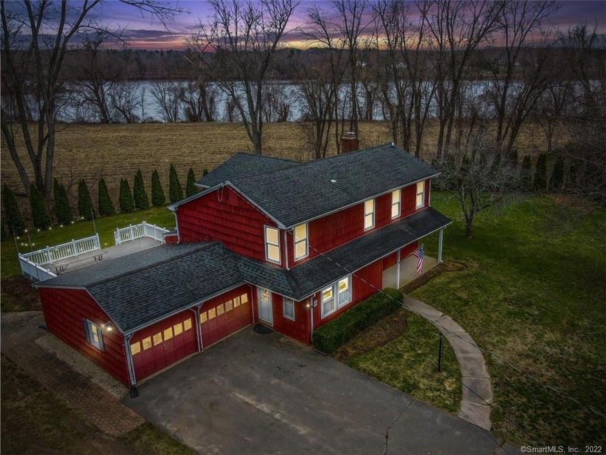 Twilight aerial view of this hidden gem of a home 
