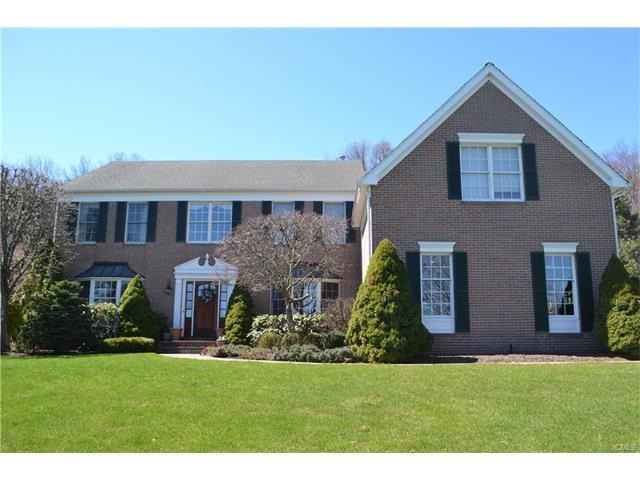Stately brick Colonial perched on hilltop