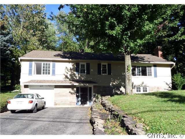 Exterior Front Beautiful stone and vinyl siding