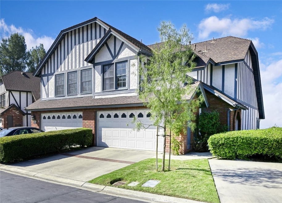 Gorgeous Tudor style home, end unit.