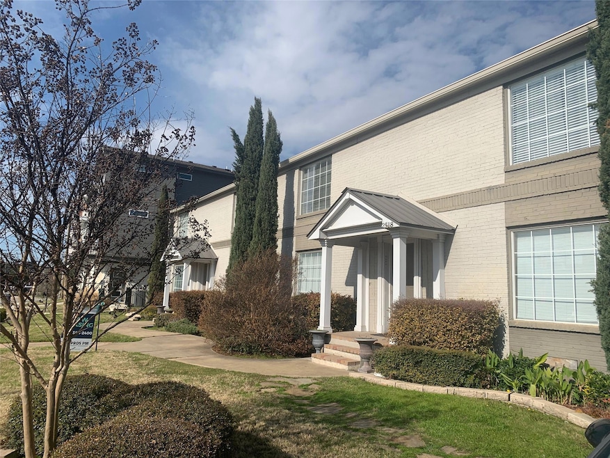 View of front of home with brick siding