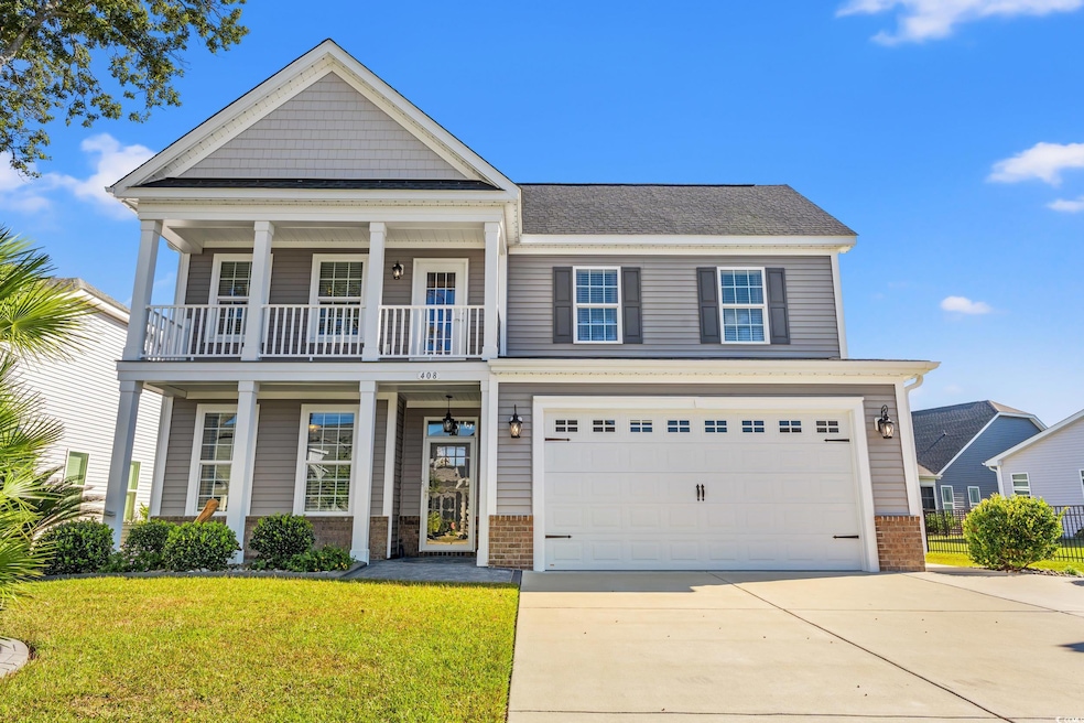 View of front of home featuring brick siding, driveway, a porch, a garage, and a front lawn.