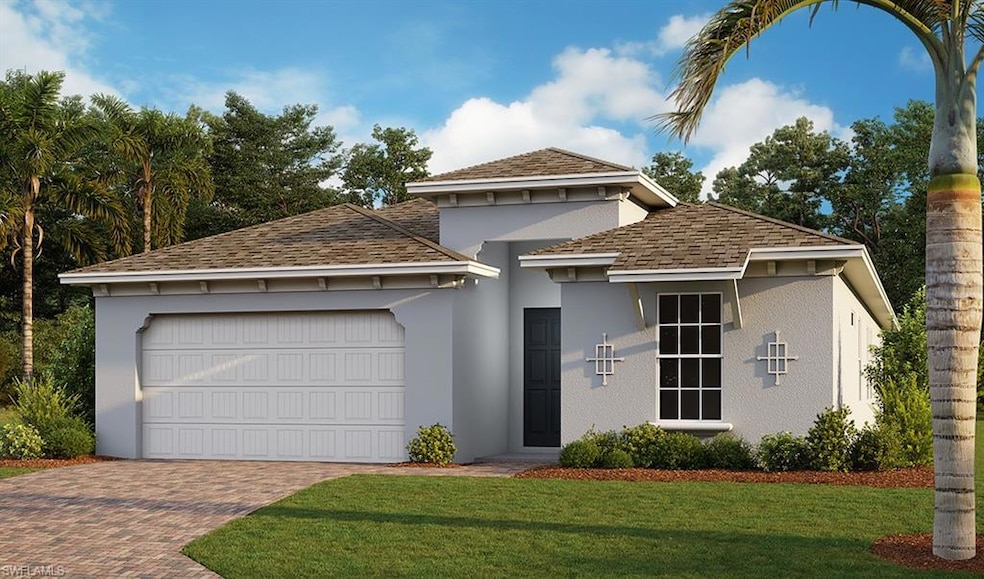 Front of property featuring a garage and a front l