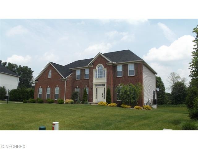 Gorgeous brick colonial features: open floor plan,